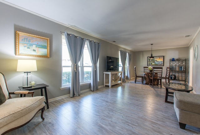 3 Sonata Trl, Little Rock, AR 72205 - living area featuring crown molding and wood finished floors