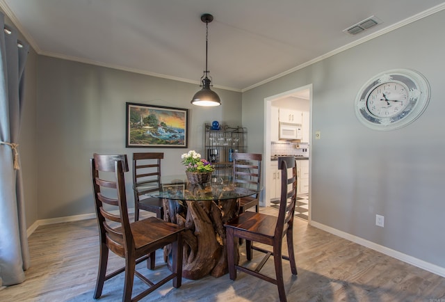 3 Sonata Trl, Little Rock, AR 72205 - dining space with wood finished floors and ornamental molding