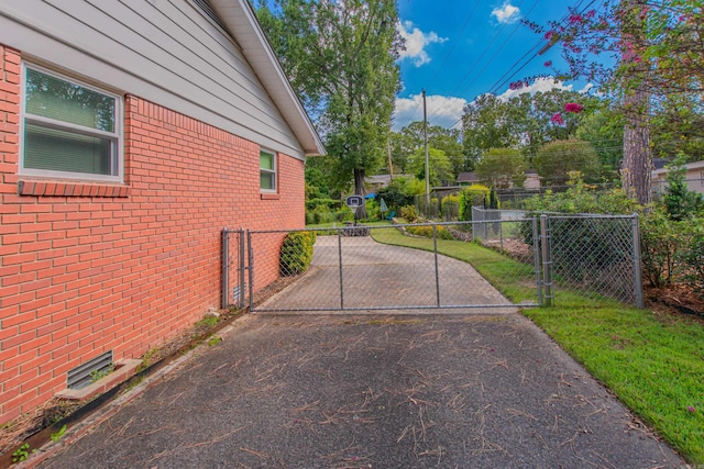 3 Sonata Trl, Little Rock, AR 72205 - view of property exterior featuring a gate and brick siding