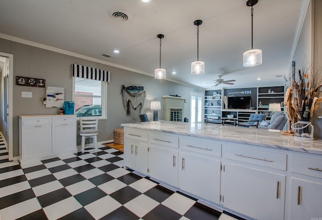 3 Sonata Trl, Little Rock, AR 72205 - kitchen with light floors, ornamental molding, a ceiling fan, white cabinetry, and open floor plan