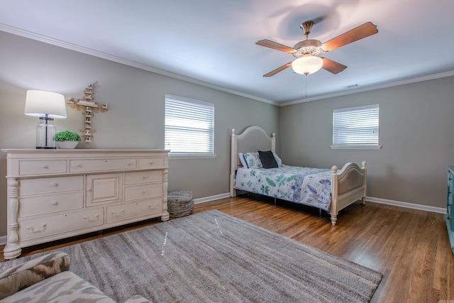 3 Sonata Trl, Little Rock, AR 72205 - bedroom with multiple windows, crown molding, wood finished floors, and a ceiling fan
