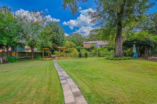 3 Sonata Trl, Little Rock, AR 72205 - fenced backyard featuring a pergola