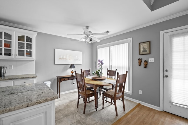 1323 Starfield, North Little Rock, AR 72116 - dining space featuring crown molding, healthy amount of natural light, and ceiling fan