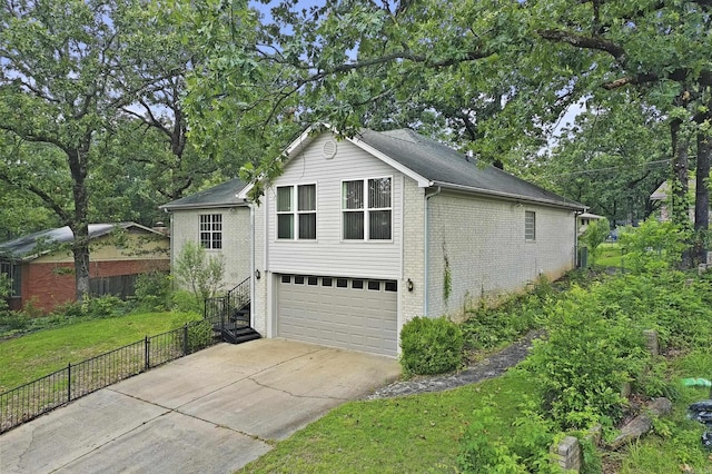 1323 Starfield, North Little Rock, AR 72116 - view of home's exterior featuring brick siding, concrete driveway, and a garage