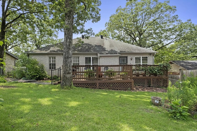 1323 Starfield, North Little Rock, AR 72116 - rear view of property featuring brick siding, a wooden deck, and roof with shingles