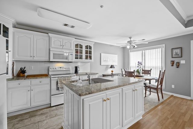 1323 Starfield, North Little Rock, AR 72116 - kitchen featuring white appliances, ornamental molding, white cabinets, tasteful backsplash, and ceiling fan
