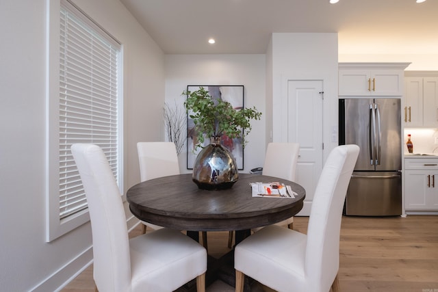 11325 Jamestown Dr, Little Rock, AR 72211 - dining area with light wood-style floors and recessed lighting