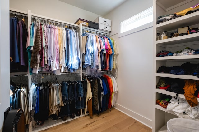 11325 Jamestown Dr, Little Rock, AR 72211 - spacious closet featuring wood finished floors