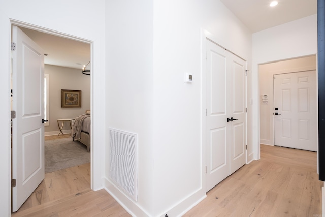 11325 Jamestown Dr, Little Rock, AR 72211 - hall with light wood-style flooring and recessed lighting