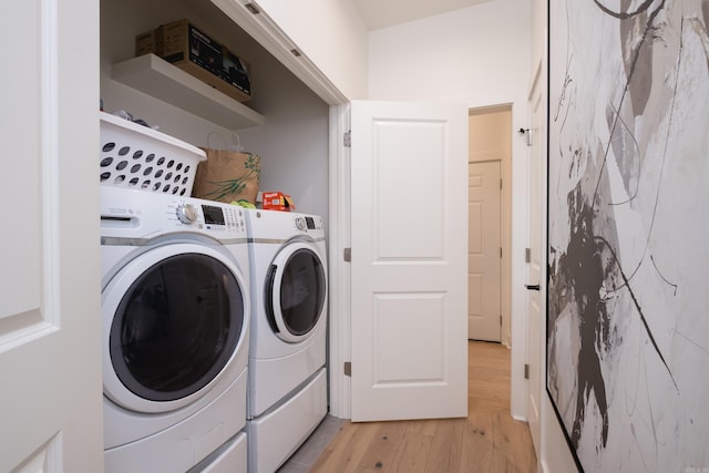 11325 Jamestown Dr, Little Rock, AR 72211 - laundry room with light wood-type flooring and washing machine and clothes dryer