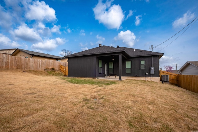 11325 Jamestown Dr, Little Rock, AR 72211 - rear view of house with a fenced backyard and a patio area