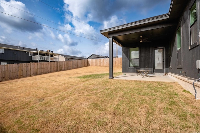 11325 Jamestown Dr, Little Rock, AR 72211 - fenced backyard featuring a patio and ceiling fan