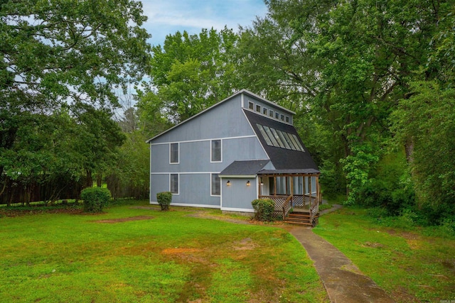 3209 Jack Mann Rd, Little Rock, AR 72210 - rear view of house featuring a yard and a wooden deck