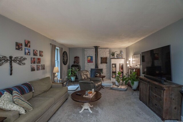 3209 Jack Mann Rd, Little Rock, AR 72210 - living room with a wood stove and carpet