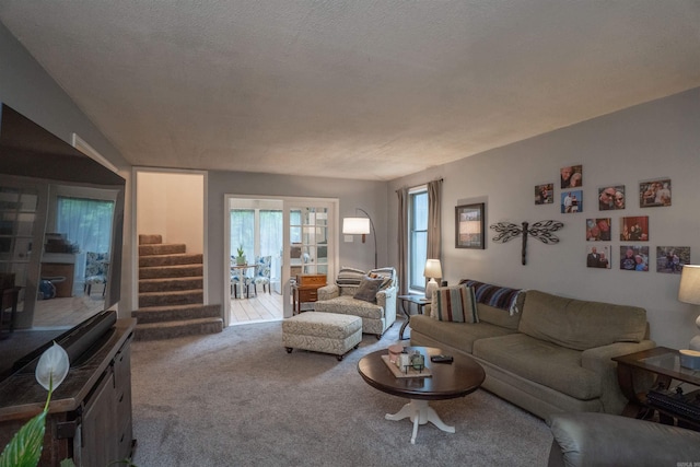 3209 Jack Mann Rd, Little Rock, AR 72210 - carpeted living area with stairs