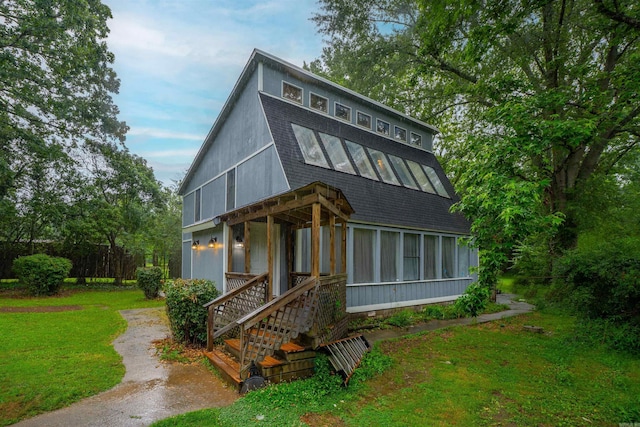 3209 Jack Mann Rd, Little Rock, AR 72210 - view of front of home with roof with shingles and a front yard