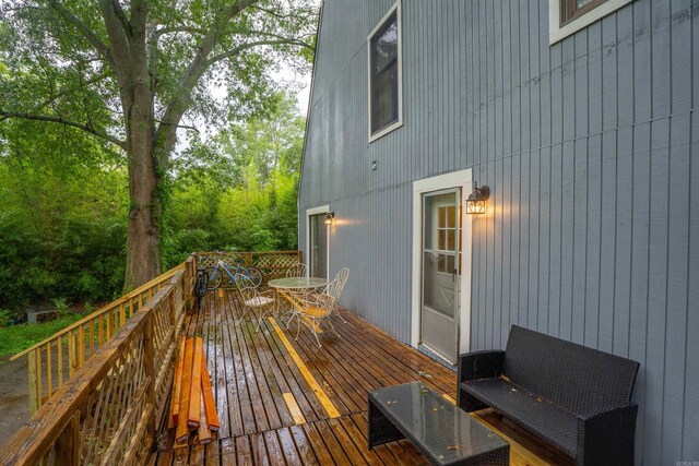 3209 Jack Mann Rd, Little Rock, AR 72210 - wooden terrace featuring outdoor dining space