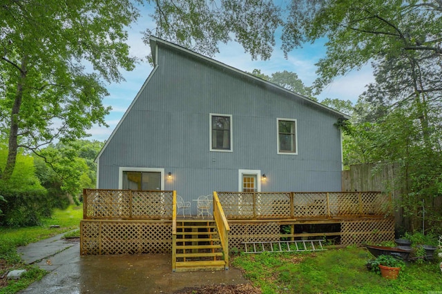 3209 Jack Mann Rd, Little Rock, AR 72210 - back of house featuring a deck