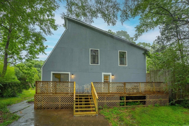 3209 Jack Mann Rd, Little Rock, AR 72210 - back of house featuring a wooden deck