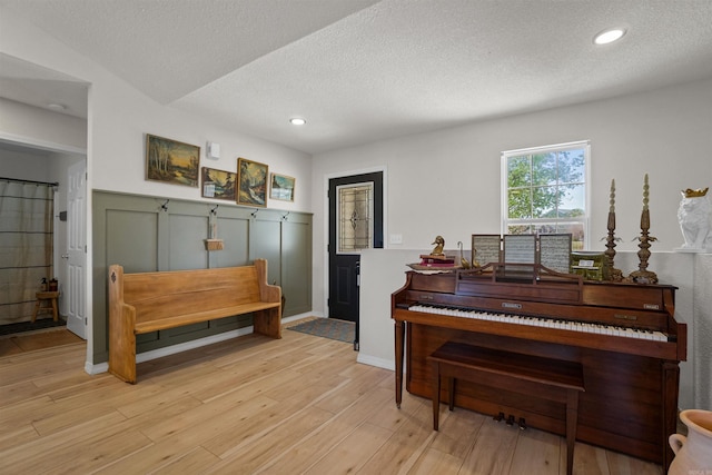 1905 Highgrove Rd, Harrison, AR 72601 - sitting room with light wood-type flooring, a textured ceiling, and recessed lighting