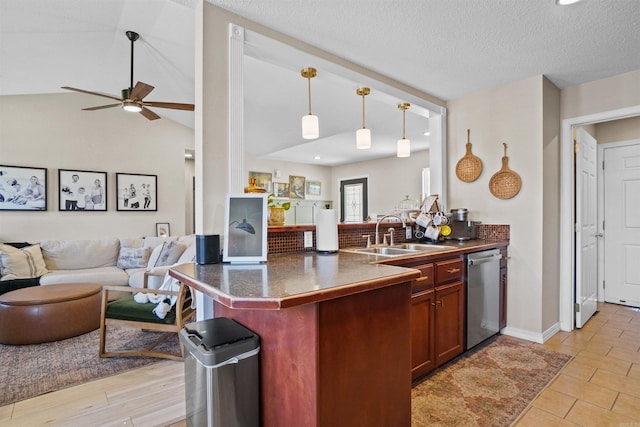 1905 Highgrove Rd, Harrison, AR 72601 - kitchen with stainless steel dishwasher, open floor plan, dark countertops, a peninsula, and recessed lighting