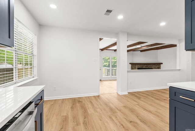 8719 Evergreen Dr, Little Rock, AR 72227 - unfurnished living room featuring light wood finished floors, beam ceiling, recessed lighting, and a fireplace