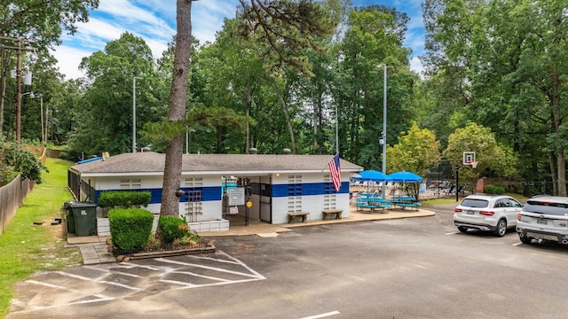 8719 Evergreen Dr, Little Rock, AR 72227 - view of building exterior with uncovered parking