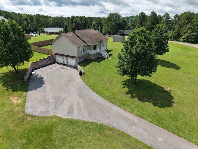 389 Plantation Cir, Melbourne, AR 72556 - aerial view of property and surrounding area featuring a heavily wooded area