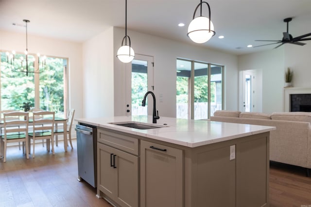 14509 Stonebrook Ln, Maumelle, AR 72113 - kitchen featuring open floor plan, stainless steel dishwasher, healthy amount of natural light, wood finished floors, and recessed lighting
