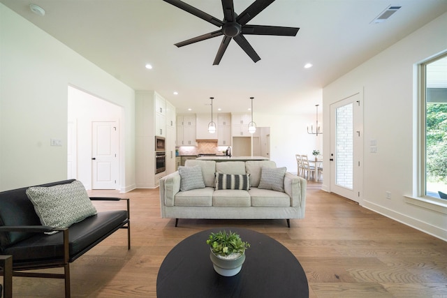 14509 Stonebrook Ln, Maumelle, AR 72113 - living room featuring recessed lighting, ceiling fan, and light wood-style floors