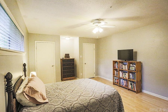 42 Bradford, Little Rock, AR 72227 - bedroom featuring wood finished floors and ceiling fan