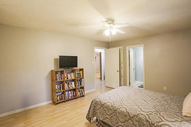 42 Bradford, Little Rock, AR 72227 - bedroom with wood finished floors and a ceiling fan