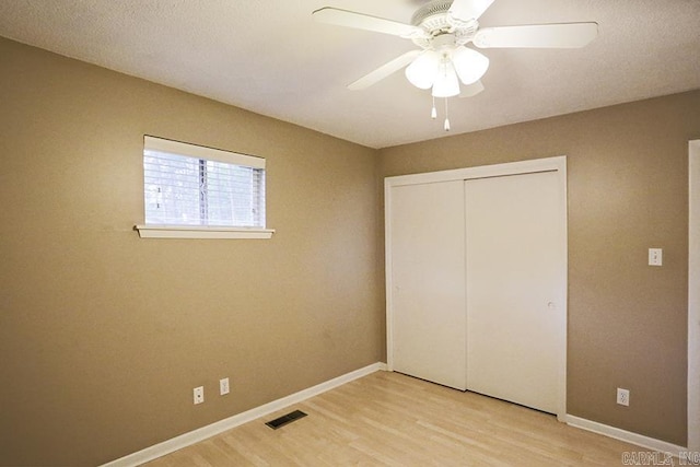 42 Bradford, Little Rock, AR 72227 - unfurnished bedroom with light wood-style flooring, a closet, and a ceiling fan