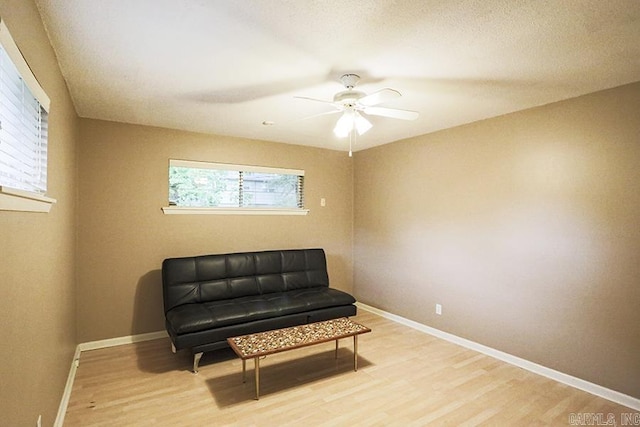 42 Bradford, Little Rock, AR 72227 - living area featuring light wood-style floors and a ceiling fan