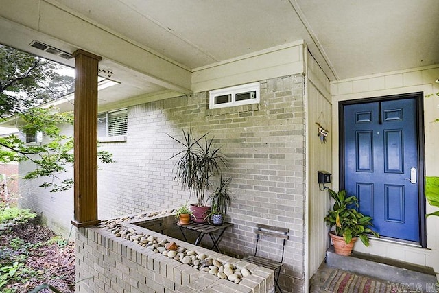 42 Bradford, Little Rock, AR 72227 - view of exterior entry with brick siding