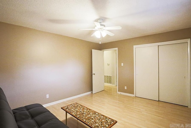 42 Bradford, Little Rock, AR 72227 - bedroom featuring light wood-type flooring, a closet, and ceiling fan