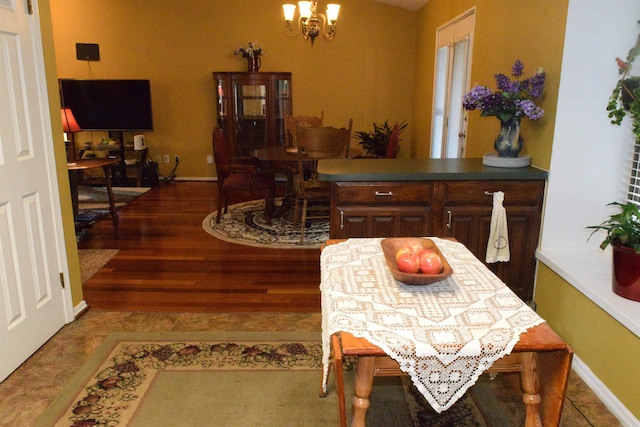 6 Lendl Loop, Little Rock, AR 72210 - dining area with a chandelier and dark wood-type flooring