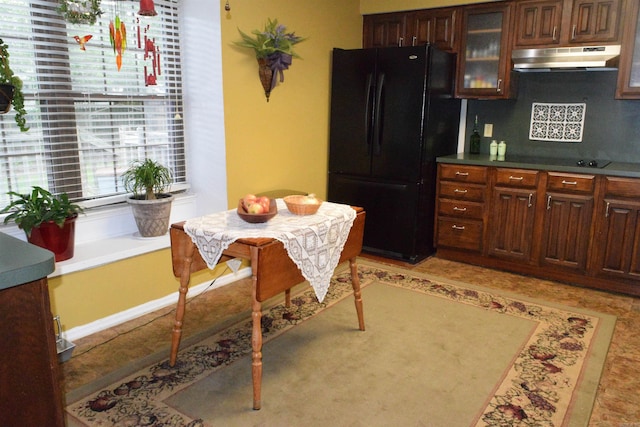 6 Lendl Loop, Little Rock, AR 72210 - kitchen with black appliances, under cabinet range hood, glass insert cabinets, and dark countertops