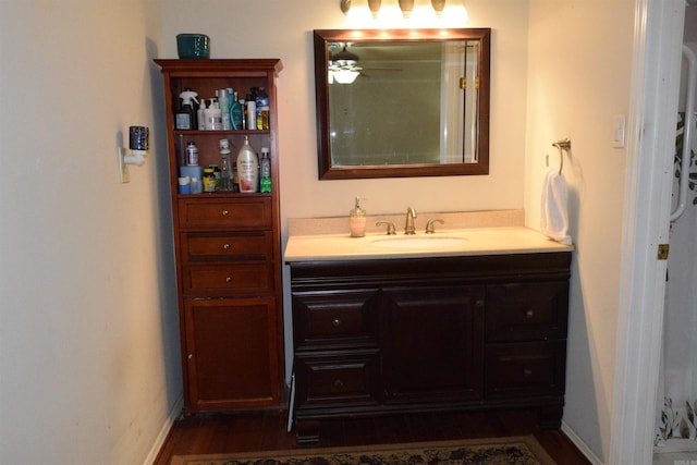 6 Lendl Loop, Little Rock, AR 72210 - bathroom featuring vanity, wood finished floors, and a ceiling fan