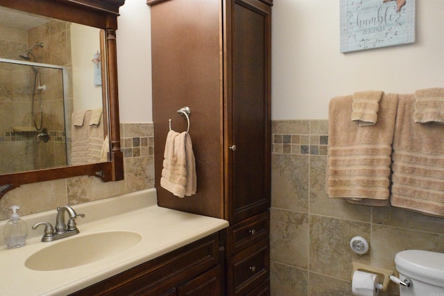 6 Lendl Loop, Little Rock, AR 72210 - full bathroom with tile walls, a shower stall, vanity, and wainscoting