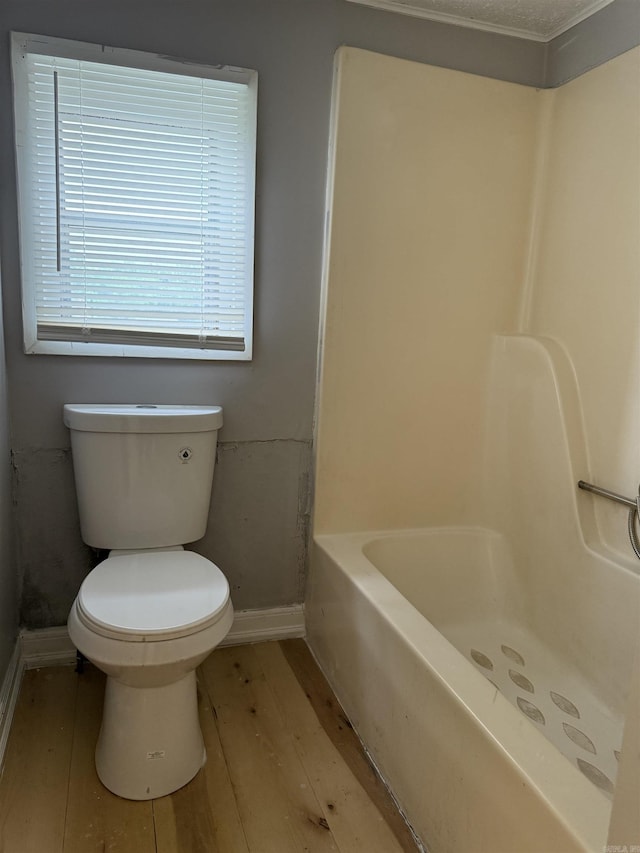 4704 Massie St, North Little Rock, AR 72118 - bathroom featuring a shower, hardwood / wood-style flooring, and a bath