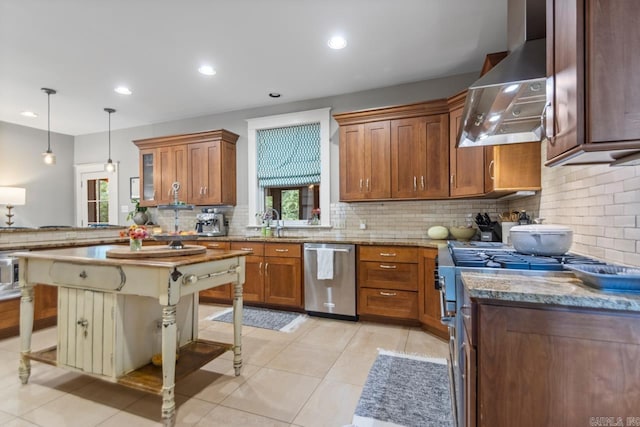 1116 Kavanaugh Blvd, Little Rock, AR 72205 - kitchen with stainless steel appliances, wall chimney exhaust hood, decorative backsplash, brown cabinetry, and light tile patterned flooring