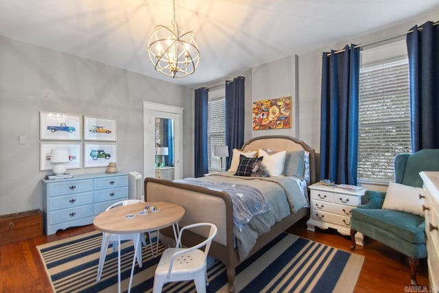 1116 Kavanaugh Blvd, Little Rock, AR 72205 - bedroom featuring a chandelier and wood finished floors