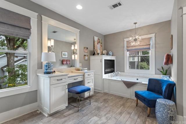 1116 Kavanaugh Blvd, Little Rock, AR 72205 - office featuring a chandelier, light wood finished floors, recessed lighting, and built in study area