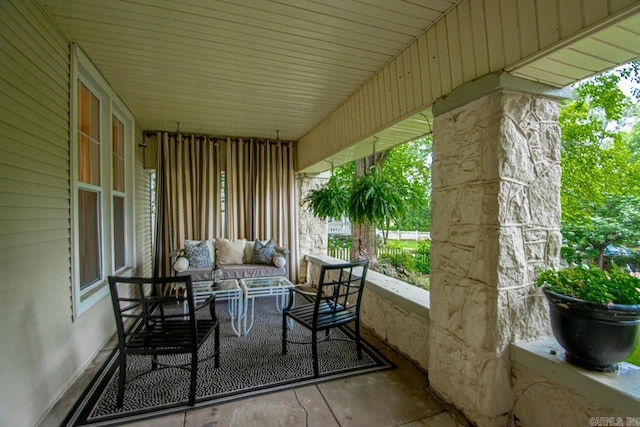 1116 Kavanaugh Blvd, Little Rock, AR 72205 - sunroom / solarium featuring concrete flooring