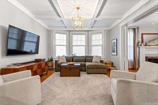 1116 Kavanaugh Blvd, Little Rock, AR 72205 - living room with wood finished floors, a chandelier, coffered ceiling, beam ceiling, and a fireplace