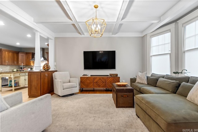 1116 Kavanaugh Blvd, Little Rock, AR 72205 - living room featuring coffered ceiling, light wood-style floors, beam ceiling, recessed lighting, and a chandelier