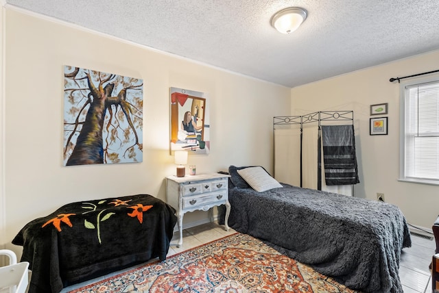 2515 N Dr, North Little Rock, AR 72118 - bedroom featuring tile patterned floors and a textured ceiling