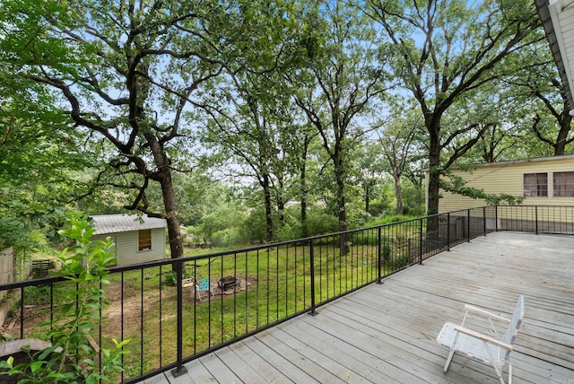2515 N Dr, North Little Rock, AR 72118 - wooden deck featuring a storage unit