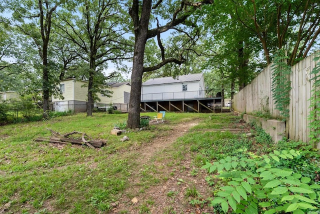 2515 N Dr, North Little Rock, AR 72118 - fenced backyard with stairs and a deck